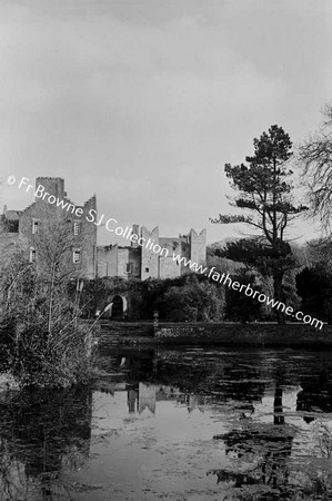 HOWTH CASTLE  LUTYEN'S TOWER (1911) AND STABLES FROM POND